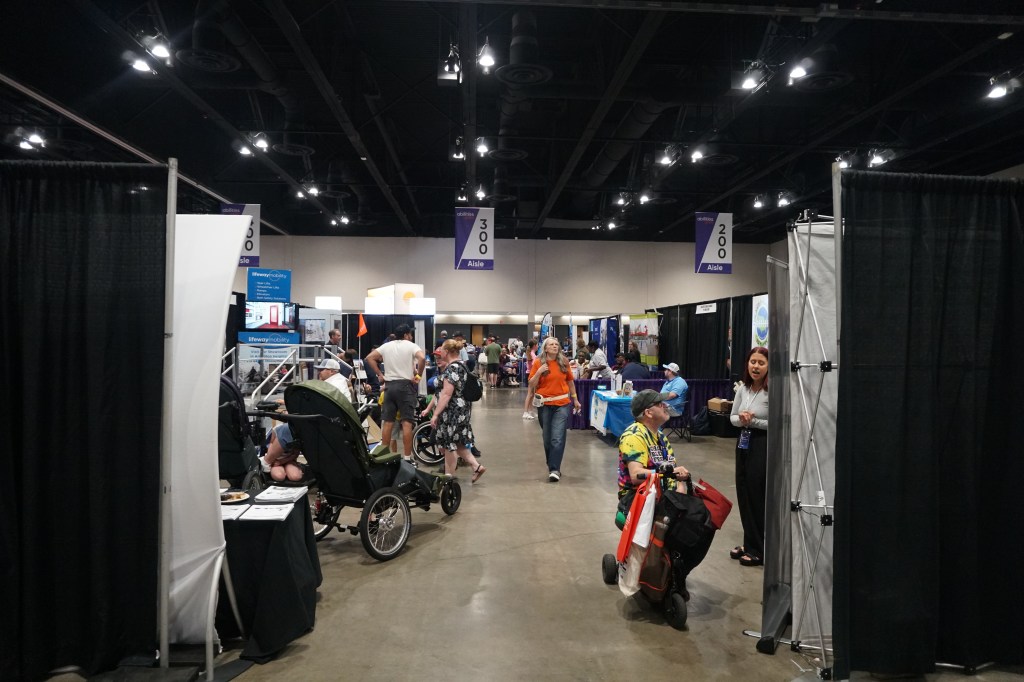 Looking down an aisle toward the rows of vendors.